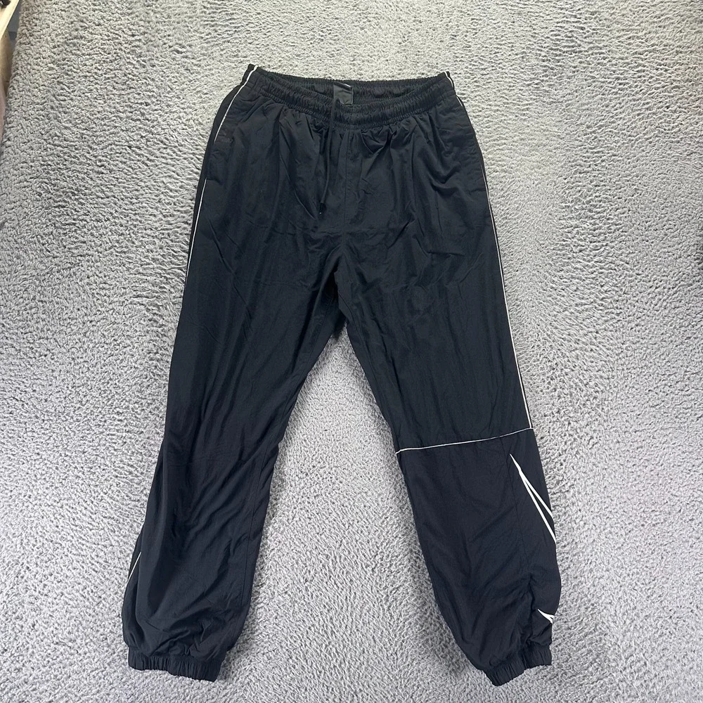 Nike SB Pant Mens S Black Nylon Jogger Tapered Mesh Lined Skateboarding Stretch